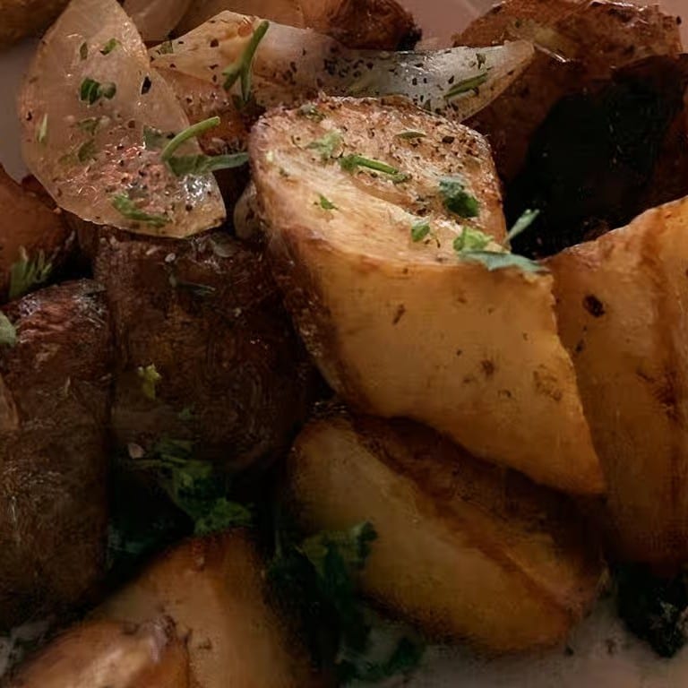 Side of Fried Potatoes with Onions.